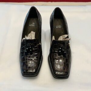 Stuart Weitzman brown leather heels.